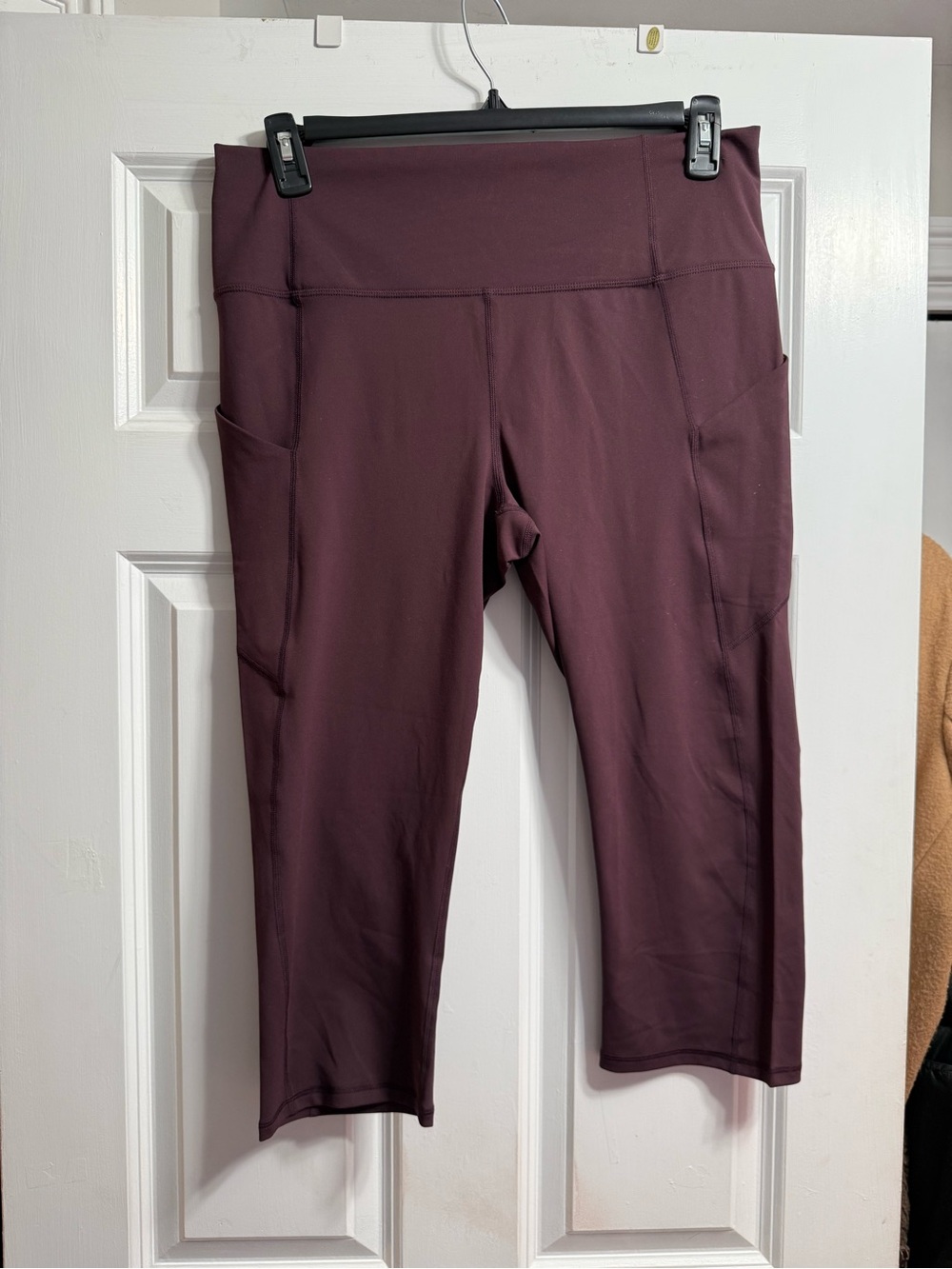 Fabletics High-Rise Capri Leggings in Plum